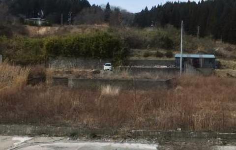 車のあるところが私たちの被災した跡地です。